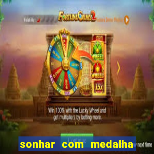 sonhar com medalha de santo